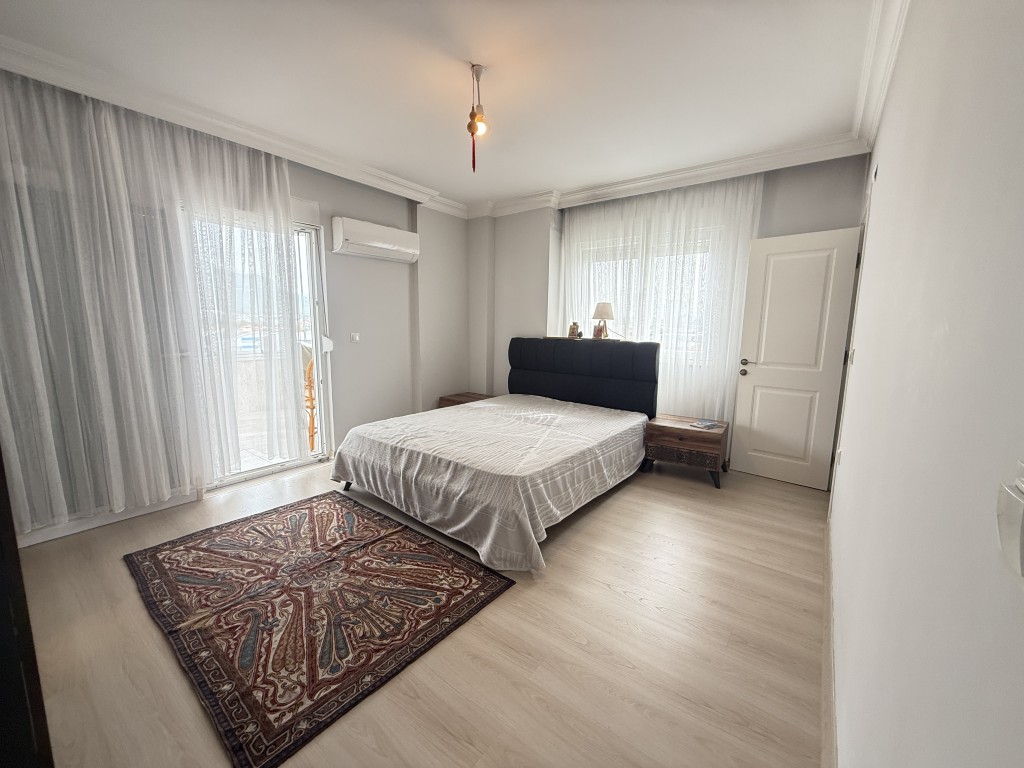 Master bedroom in Galaxy Cikcilli furnished flat