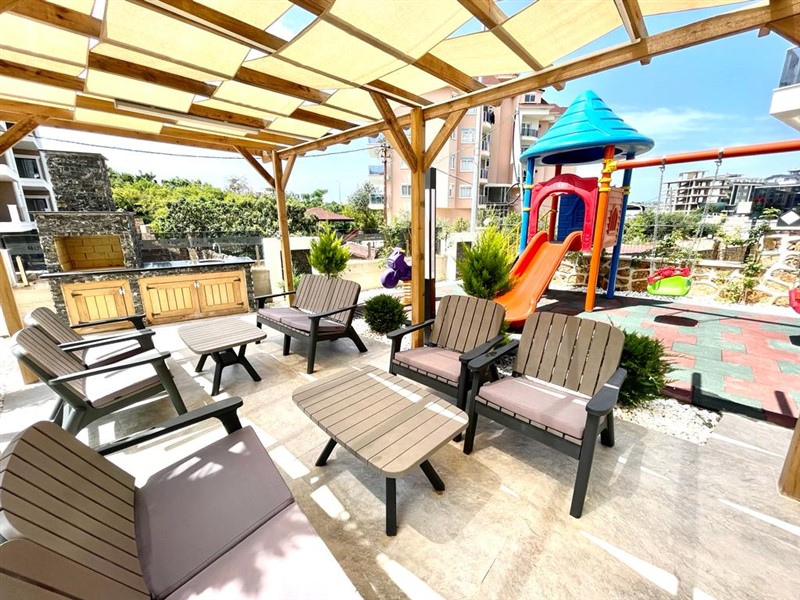 Outdoor social areas at United Suites Oba