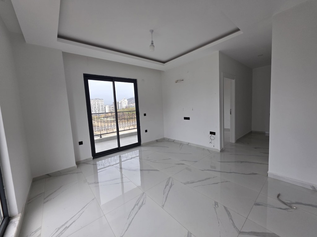 Unfurnished living room in Best Life 10 Mahmutlar flat