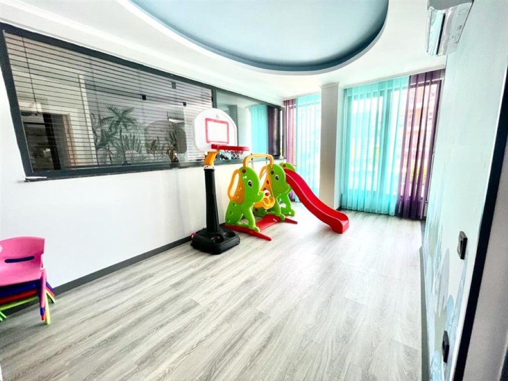 Indoor children’s playground area for families.