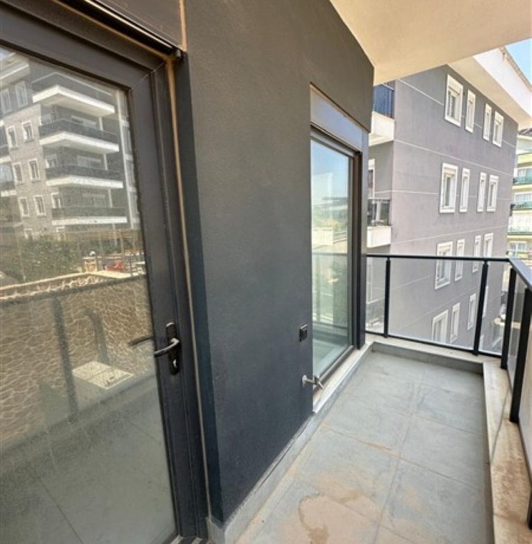Private balcony of the 2nd-floor apartment in Oba.