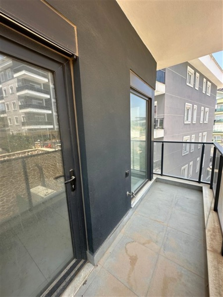 Private balcony of the 2nd-floor apartment in Oba.