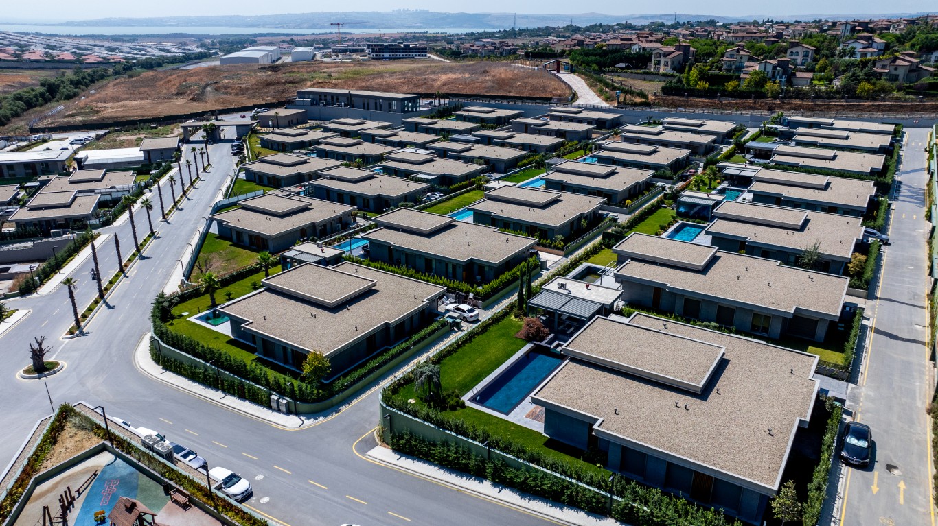 Aerial drone shot of the 9- Brand Vadi (Orta).jpg project showing fully detached luxury villas, each featuring private pools, expansive gardens, and green landscapes.