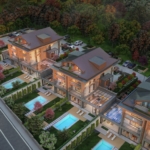 İstanbul’un Ömerli semtindeki CG Elite Garden’da bulunan, özel havuzlu üç ultra lüks villanın havadan görünümü.