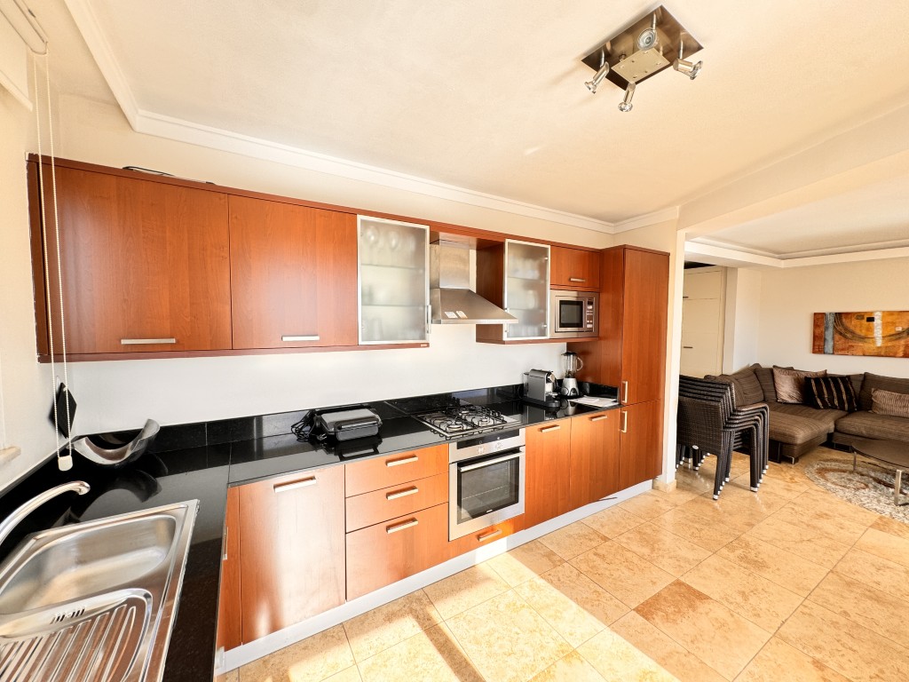 Fitted kitchen with built-in appliances in Hellios Residence, Cikcilli, Alanya