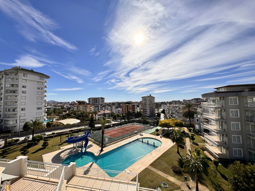 View over the swimming pool and aquapark at Hellios Residence, Cikcilli, Alanya