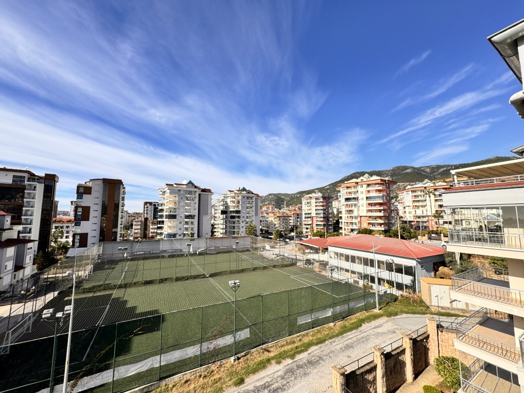 View of the sports court and mountains from Hellios Residence, Cikcilli, Alanya