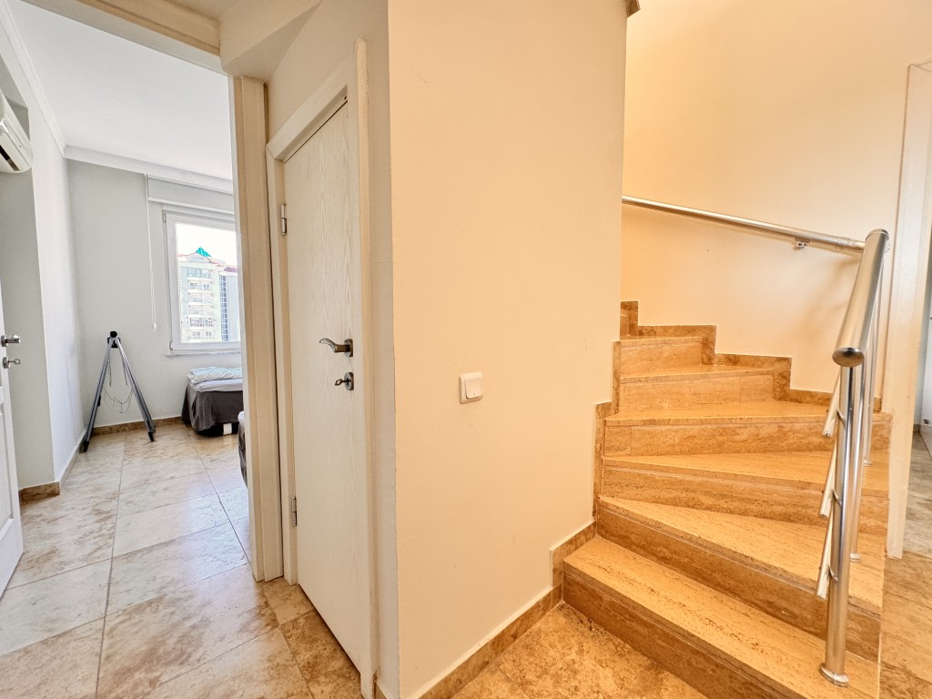 Internal staircase leading to the upper floor in Hellios Residence, Cikcilli, Alanya