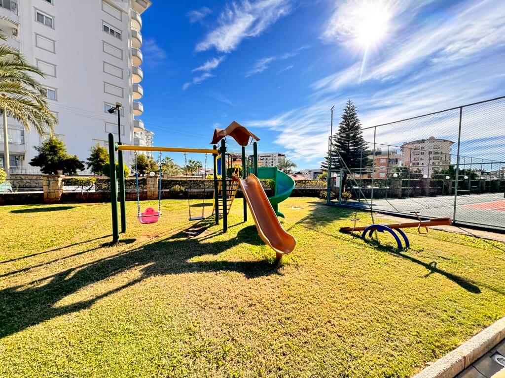 Children's playground in the landscaped grounds of Hellios Residence, Cikcilli, Alanya
