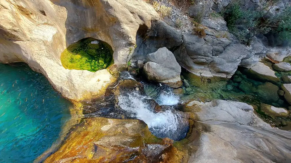 Rock formations and water in Sapadere Canyon, photographed November 2024