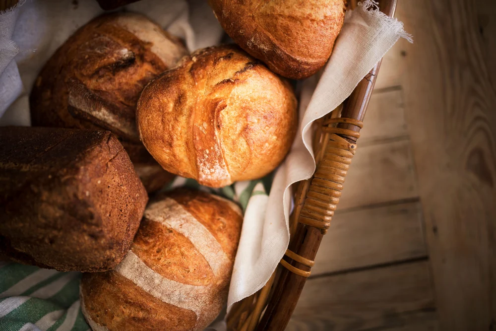 Fresh bread for the table · illustrative lifestyle photograph