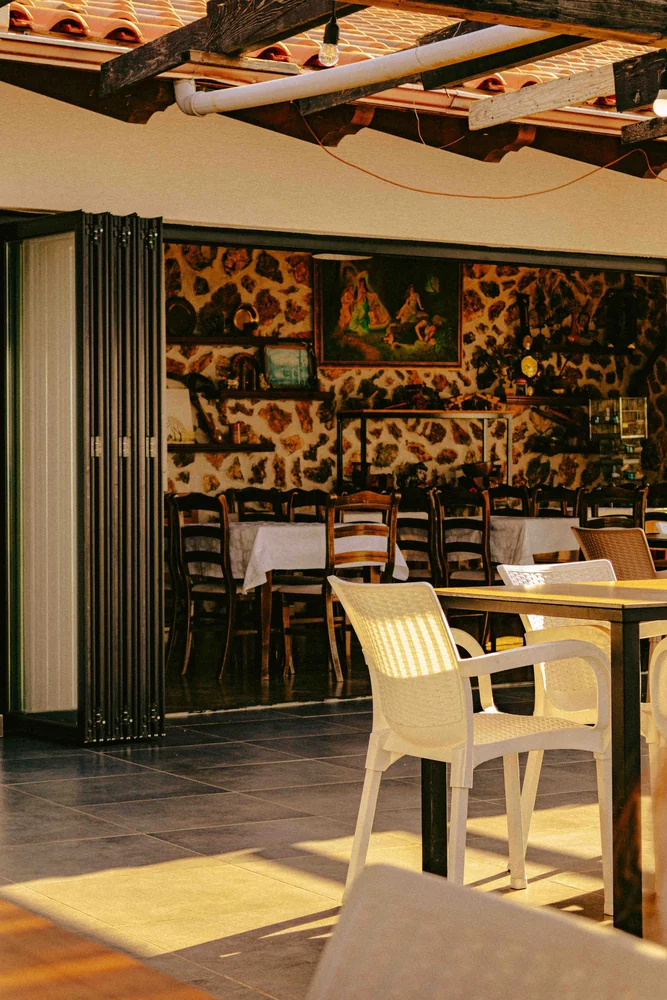 A restaurant in warm afternoon light · illustrative lifestyle photograph