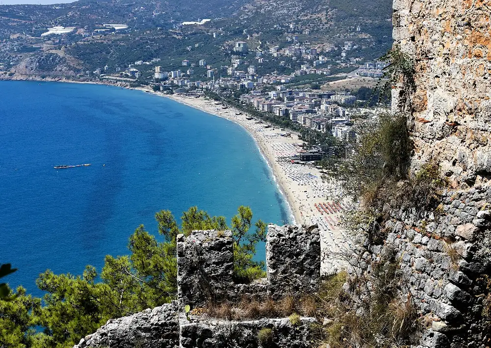 The castle citadel with Kleopatra Beach beyond · a view across the area