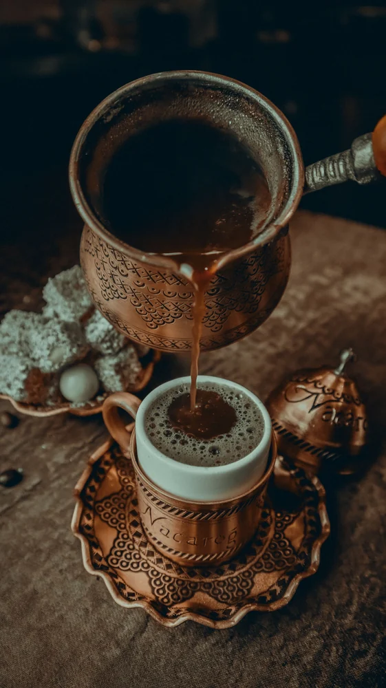 Turkish coffee being poured · illustrative lifestyle photograph