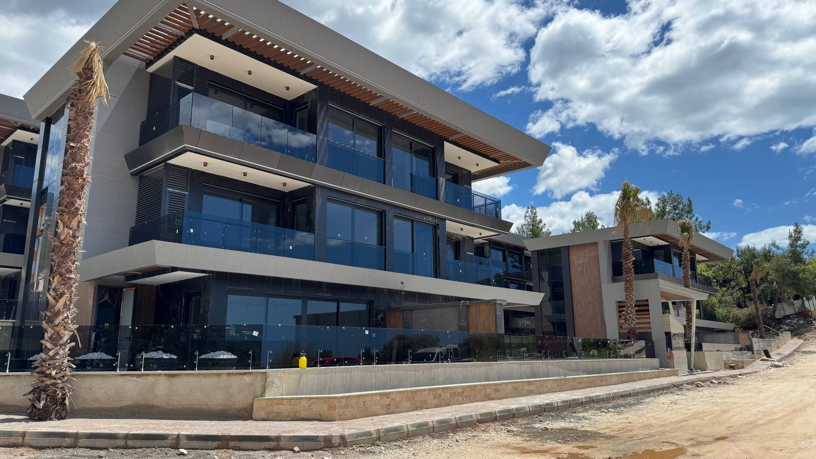 Project facade photographed May 2026